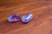 Load image into Gallery viewer, Close up of Light Purple Ametrine Tumbles with slight yellow inclusions

