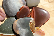 Load image into Gallery viewer, Polychrome Jasper Hearts in varying palm sizes, in shades of storm grey, green and warm oranges
